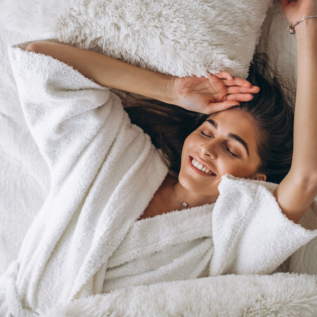 Women smiling and enjoying the sensations and vibrations after the Quantum Remote healing session